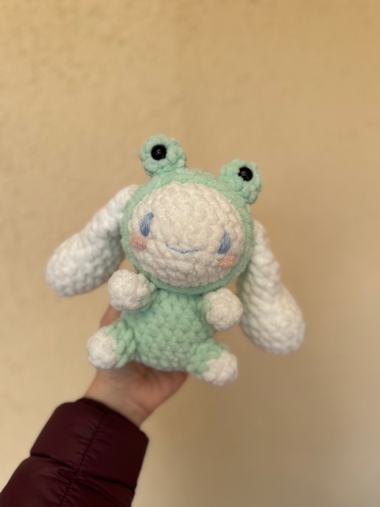 Crochet Cinnamaroll in a frog costume